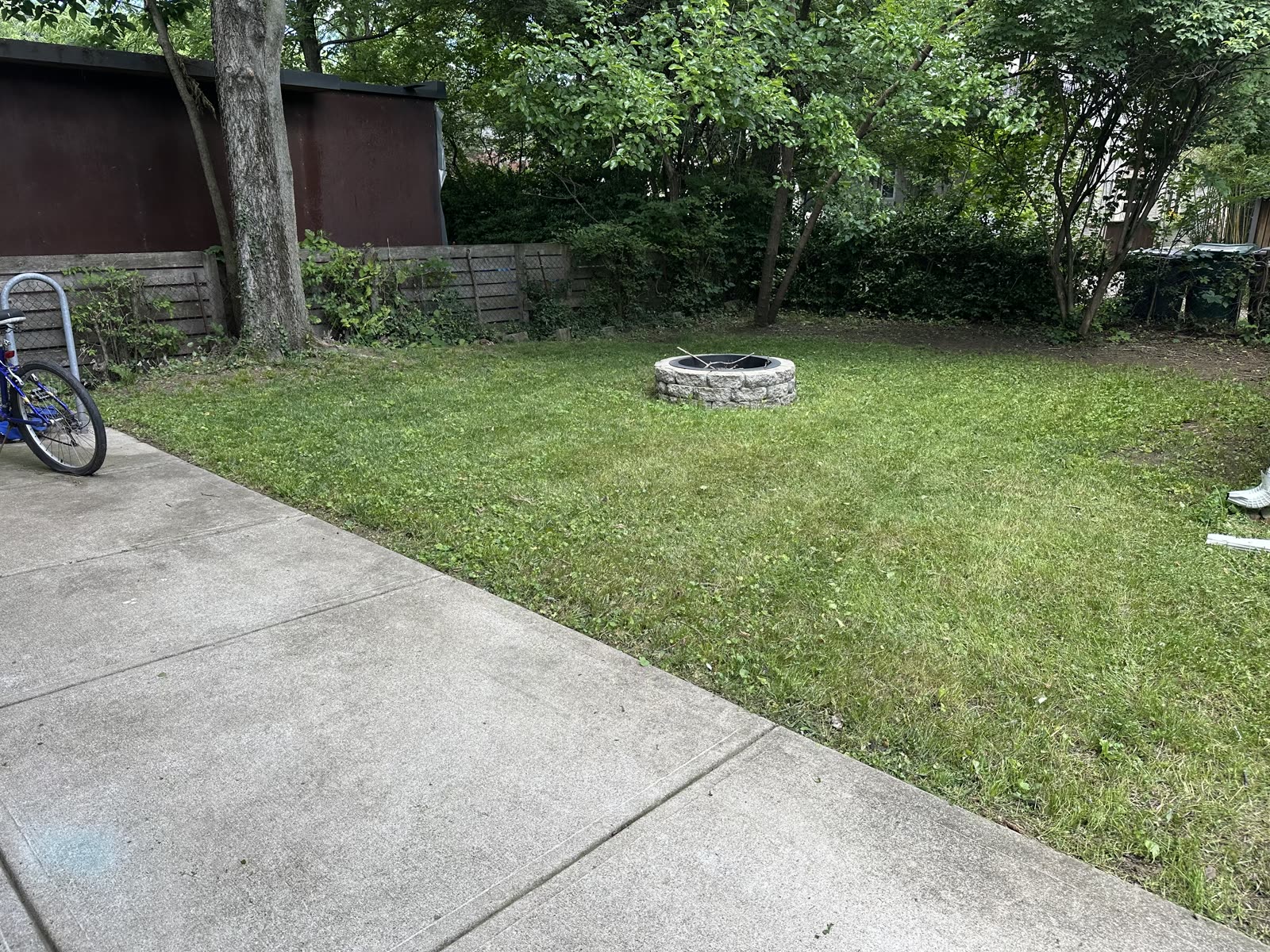 Backyard lawn and fire pit